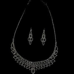 A formal necklace and a pair of earring